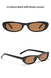 Detail view of glossy black rectangle frame sunglasses with brown lenses in Y2K style
