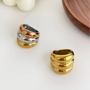 Three-tone chunky titanium steel rings in 18K gold, silver and rose gold finishes
