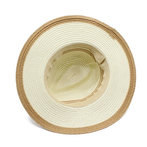 Detail view of the straw hat interior with sweatband and adjustable drawstring feature