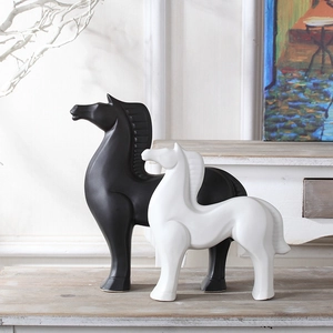 Modern ceramic horse statues in black and white matte finish for minimalist home decor