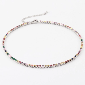 Vibrant rainbow tennis necklace with colorful crystals and silver prong setting