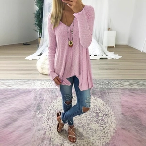 Pink V-neck long sleeve waffle knit sweater in a loose casual style for women