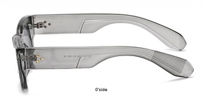 Macro view of rectangular translucent gray sunglasses frame with silver arrow rivets