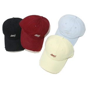 Detail view of cotton baseball caps with okey embroidery and distressed brim elements