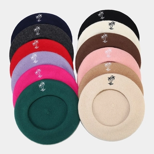 Classic wool beret for women featuring coconut tree embroidery in multiple colors