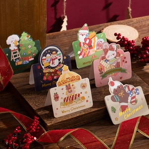 Set of 6 creative 3D gold-stamped Christmas cards with festive characters and envelopes