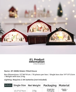 Close-up of lighted Christmas water lantern with Santa and reindeer scene inside