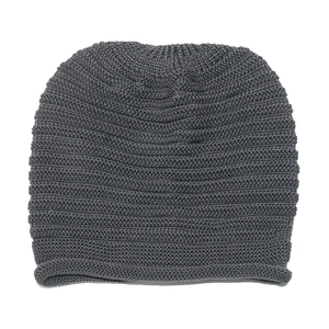Close-up of the dark grey fine knit texture and rolled hem edge on the winter beanie hat