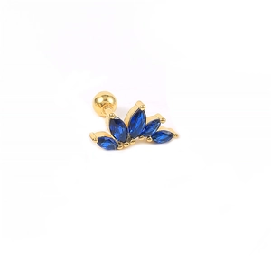 Macro detail of a gold crown stud earring featuring five marquise-cut deep blue gemstones