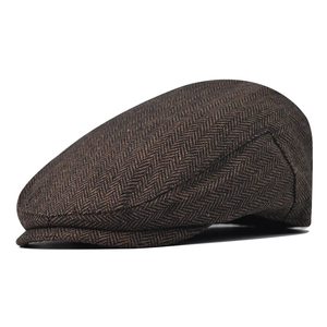 Classic men's brown herringbone flat cap with a vintage British style wool blend fabric