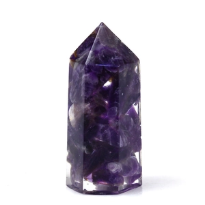 Handmade amethyst crystal resin hexagonal energy tower on a white background