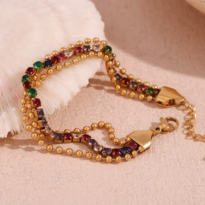 Close-up of a double-layer 18K gold plated bracelet featuring colorful zircon stones
