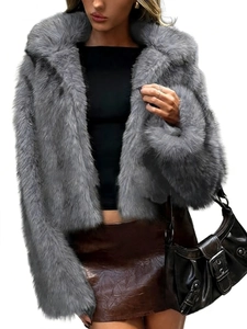 Detail of grey faux fur jacket texture with luxury fluffy finish and short lapel design