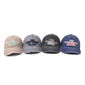 Distressed cotton baseball caps with Mysterious Island embroidery in four retro colors