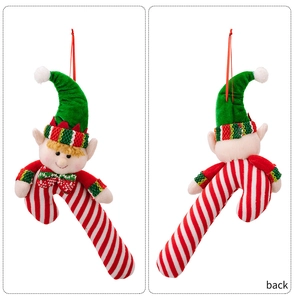 Front and back view of a plush Christmas elf candy cane ornament with red and white stripes