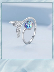 Detailed macro view of S925 sterling silver mermaid tail ring with shimmering fish scales