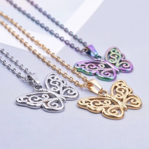 Three butterfly pendant necklaces in gold, silver and rainbow finish with O-chains