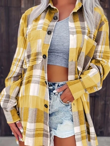 Relaxed fit plaid button-up shirt for women in yellow and grey with a long sleeve design
