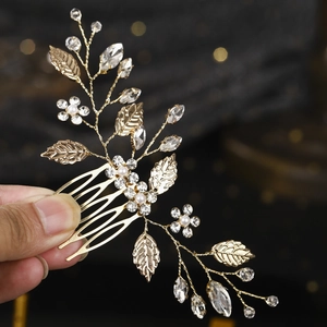 Handcrafted gold leaf hair comb with pearls and rhinestones for bridal hairstyles