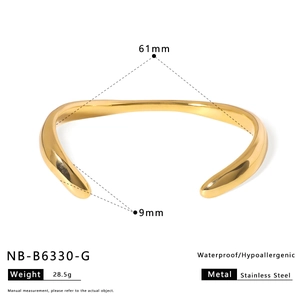 Detail view of 61mm gold stainless steel bangle with dimensions and product specifications