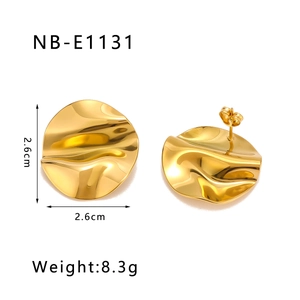 Detail of 18K gold plated wavy round earrings showing 2.6cm size and 8.3g weight