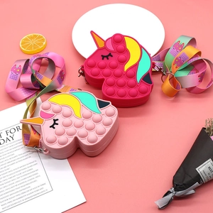 Unicorn silicone pop-it shoulder bags in pink for kids with adjustable cartoon straps