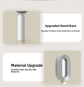 Detail of the standing base and durable ABS material of the massage hairbrush