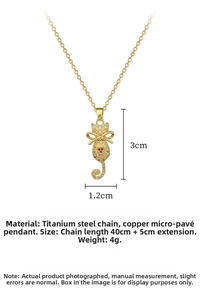 Detailed view of gold cat pendant with bow and rhinestones showing exact dimensions