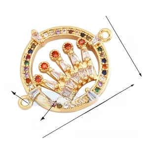 Detailed view of crown shaped jewelry connector with gold plating and colorful zircons