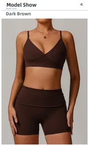 Detail of cross back yoga bra and high waist shorts set in dark espresso brown