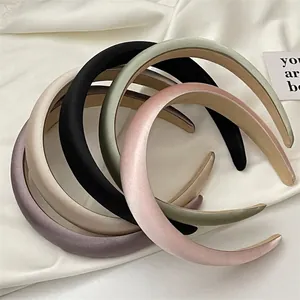 Elegant satin sponge headbands in multiple pastel colors with premium velvet texture
