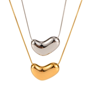 Minimalist gold and silver bean pendant necklaces with sleek snake chains for women