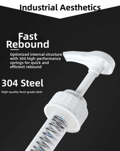 Close-up of 304 stainless steel spring inside white pump head for syrup dispenser bottle