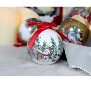Close-up of a white 8cm Christmas foam ball featuring snowman and winter house scenes