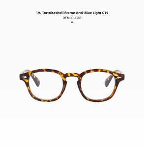 Detail of demi clear Boston frames with anti-blue light lenses and silver rivet accents