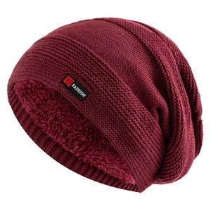 Detail of burgundy ribbed knit beanie with soft fleece lining and FS FASHION leather patch