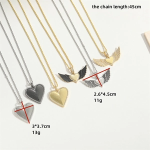 Chic heart pendant necklace set in gold and silver with dimensions and stone details