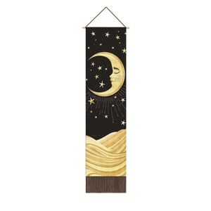 Close-up of celestial moon face tapestry with golden waves and rustic wooden frame