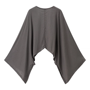 Rear view of loose-fit dark grey batwing top with textured fabric and V-shaped hem
