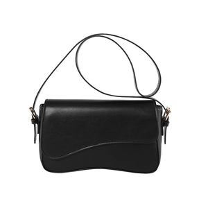 Minimalist black leather crossbody bag with wavy edge flap and golden metal hardware
