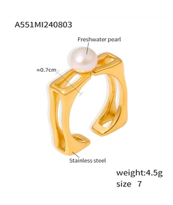 Detailed view of 18k gold plated stainless steel square ring with a freshwater pearl