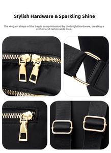 Detail of high-quality gold hardware and zipper on a black waterproof oxford backpack