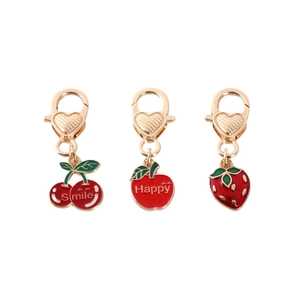 Zinc alloy fruit keychain set featuring cherry, apple, and strawberry with heart clasps
