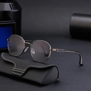Fashionable round metal frame sunglasses in gunmetal grey with black leather case