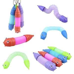 Detail of colorful caterpillar pop tubes in stretched and bent positions for sensory play