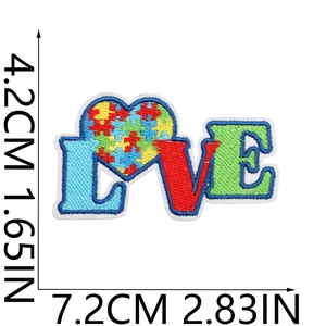 Detailed size view of Love Autism awareness heart puzzle embroidered patch on white background