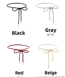 Detail of thin waist ropes with bows, gold metal tips and pearls in four classic colors