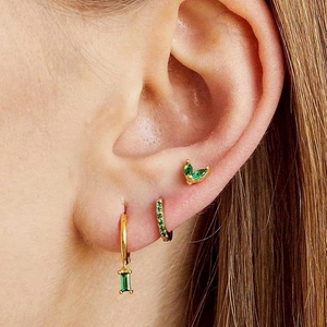 18K gold plated earring set with green zircons featuring leaf studs and emerald cut charms
