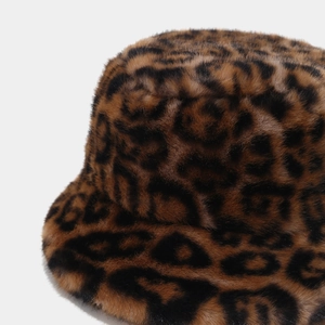 Close-up of leopard print faux fur bucket hat showing soft winter fabric texture