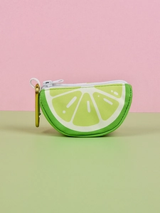 Detailed close-up of lime-shaped pet waste bag dispenser with a metal snap hook